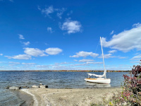 Beached Stur-dee Cat sailboat
