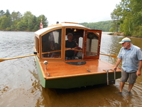 Houseboat under oars